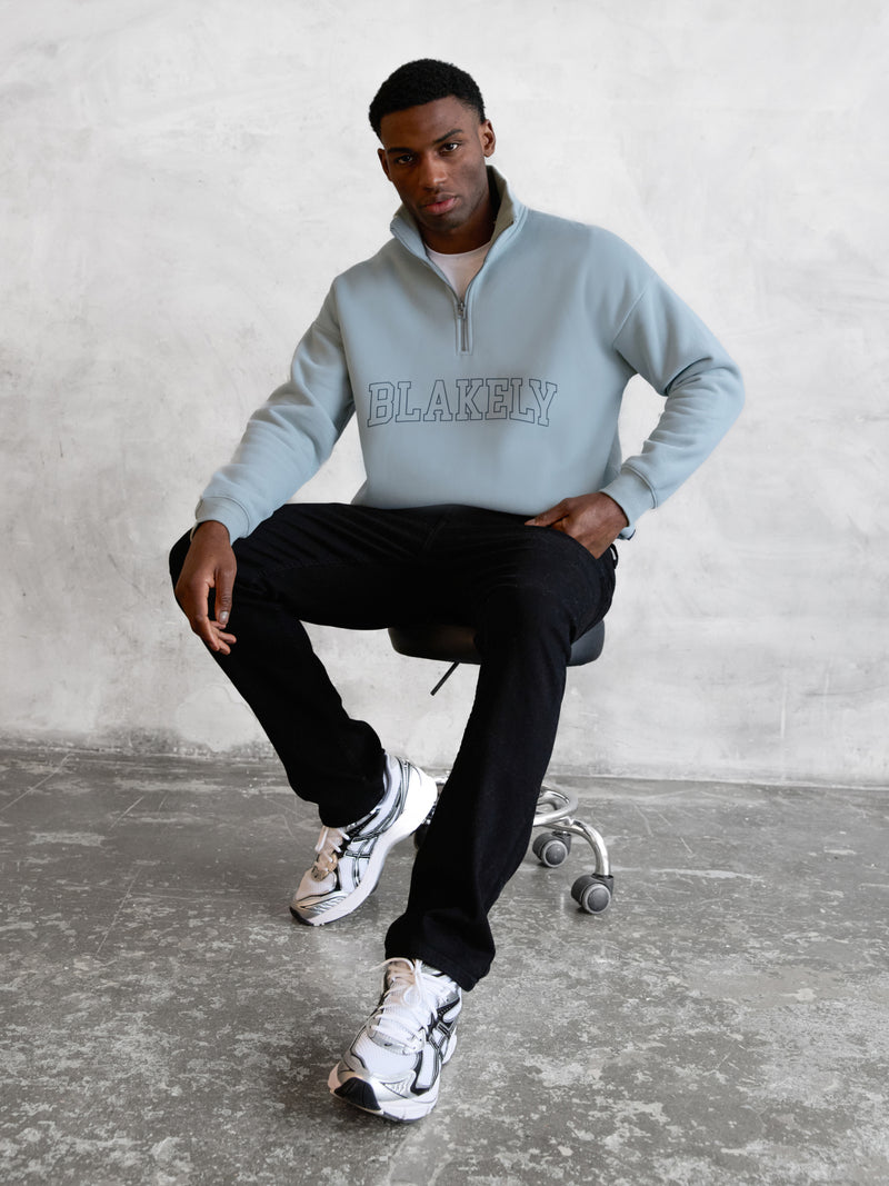 Outline Varsity 1/4 Zip Up Sweater - Mineral Blue