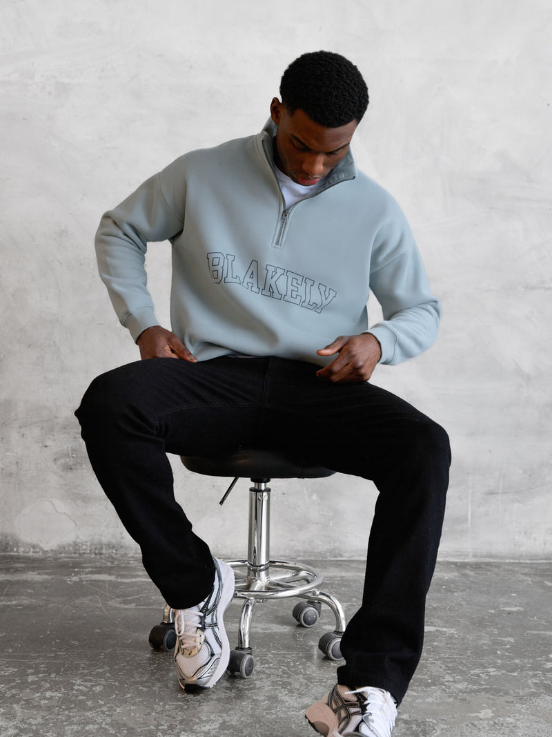 Outline Varsity 1/4 Zip Up Sweater - Mineral Blue