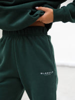 Universal Women's Relaxed Sweatpants - Dark Green